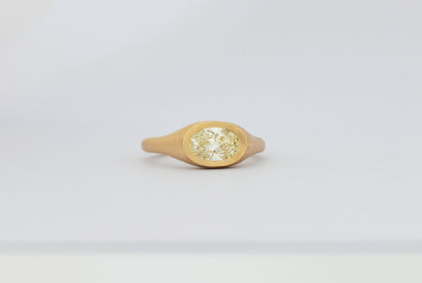 Slim oval diamond ring