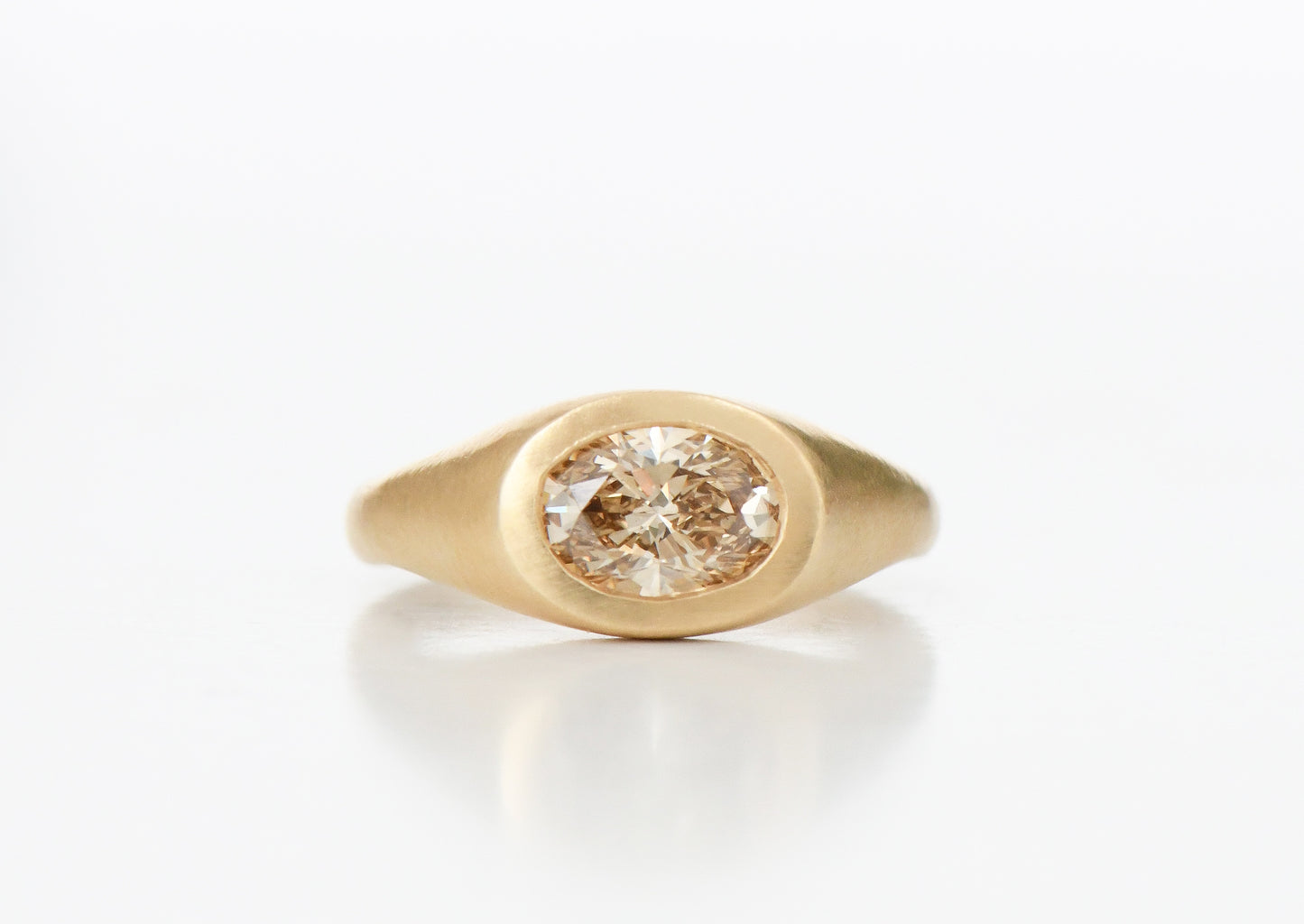 BROWN OVAL DIAMOND RING