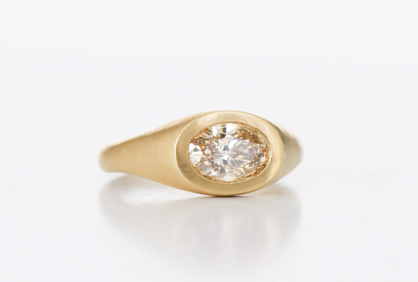BROWN OVAL DIAMOND RING