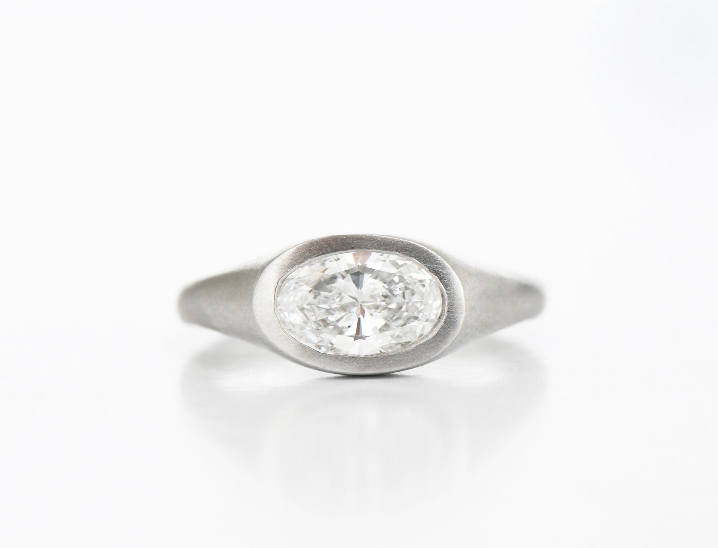 PLATINUM OVAL DIAMOND RING