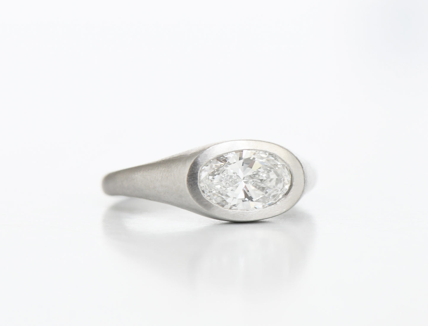 PLATINUM OVAL DIAMOND RING