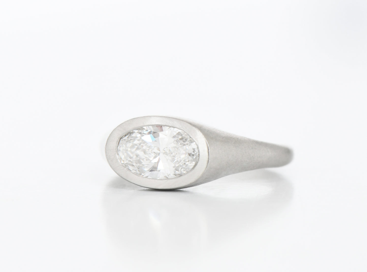 PLATINUM OVAL DIAMOND RING